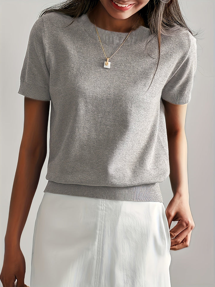 Top donna elegante con vestibilità regolare, perfetto per comfort e stile.