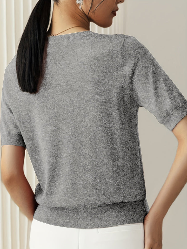 Elegante maglietta da donna a maniche corte, vestibilità regolare per ogni occasione.