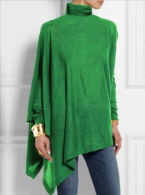 Dettagli bottoni sulla spalla del top donna collo alto asimmetrico, un capo di tendenza per l'inverno.