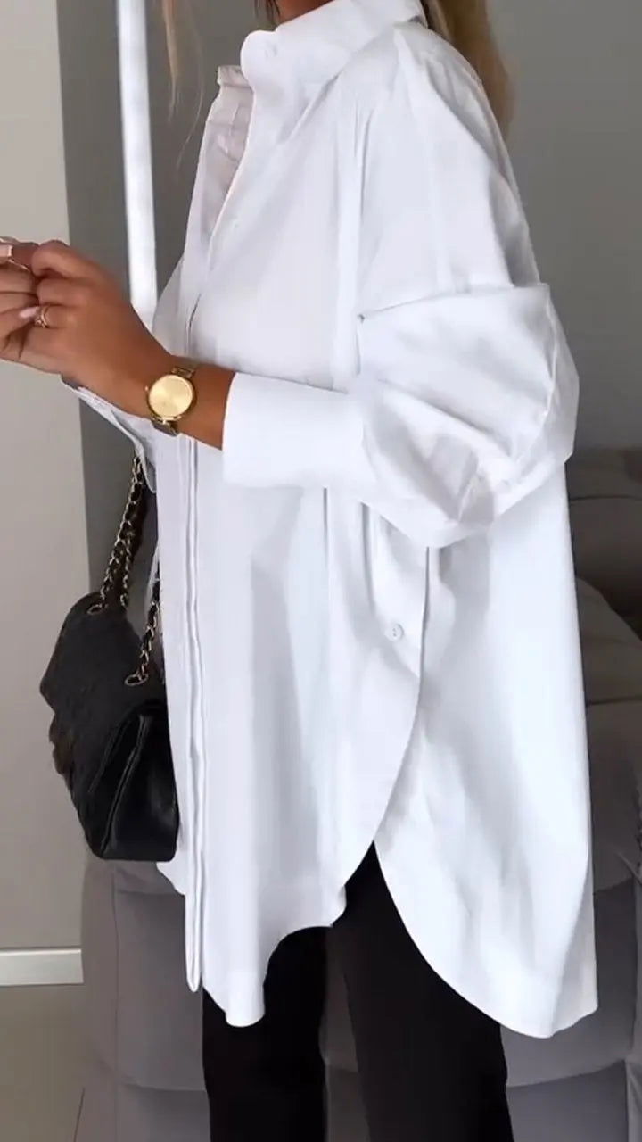 Moda donna: camicia con maniche lunghe e polsini risvoltati, vestibilità comoda, versatile per ogni occasione.
