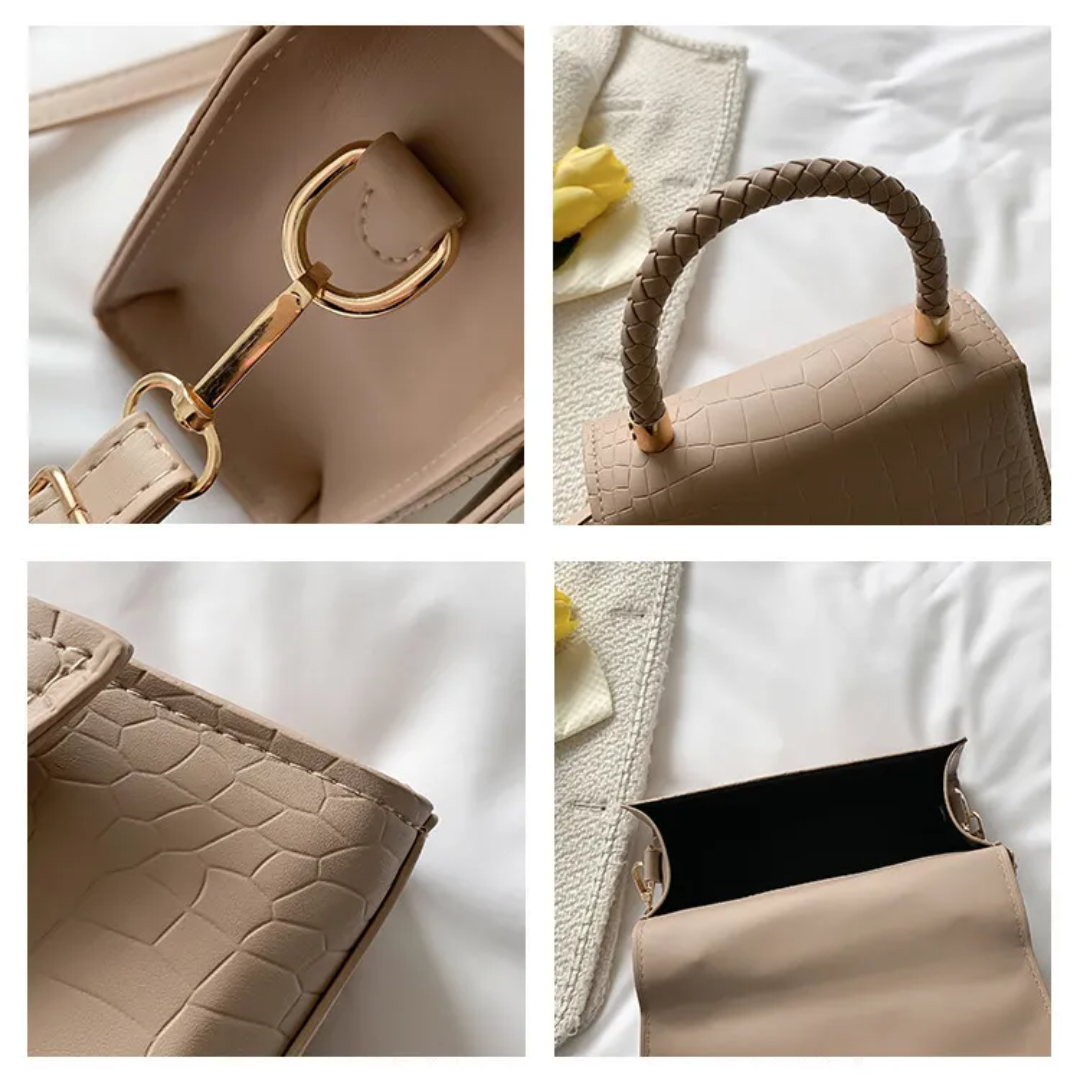 Borsa donna nera versatile, con manico e tracolla. Perfetta come borsa a mano elegante e pratica.