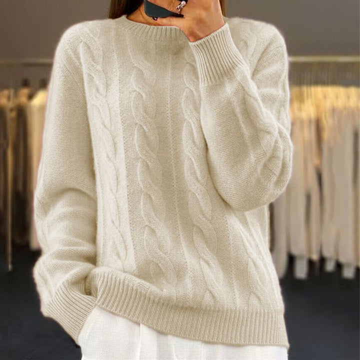Maglione donna a trecce morbido, girocollo, ideale per inverno casual-elegante.