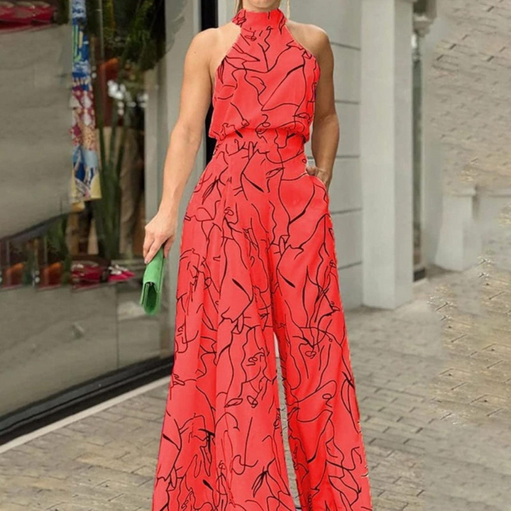 Tuta intera donna primaverile/estiva, design senza maniche e vestibilità comoda.