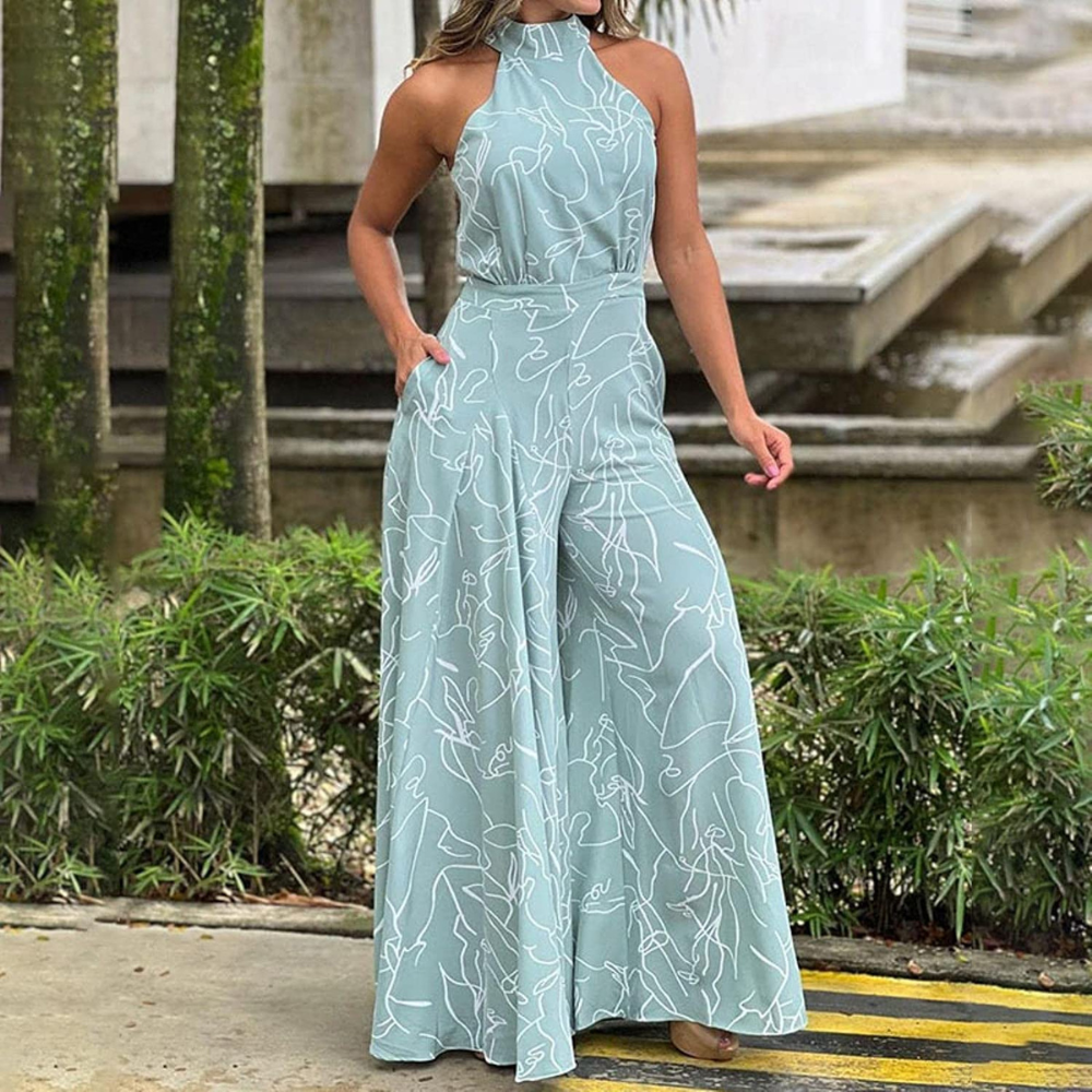 Tuta donna leggera senza maniche, con cintura per una silhouette definita, primavera.