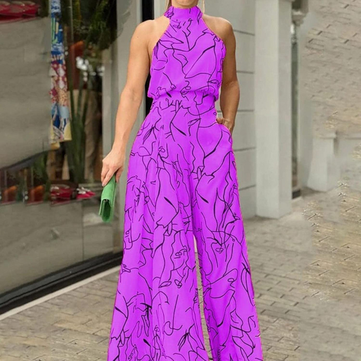 Jumpsuit donna chic, senza maniche, con cintura che valorizza la figura, moda estiva.