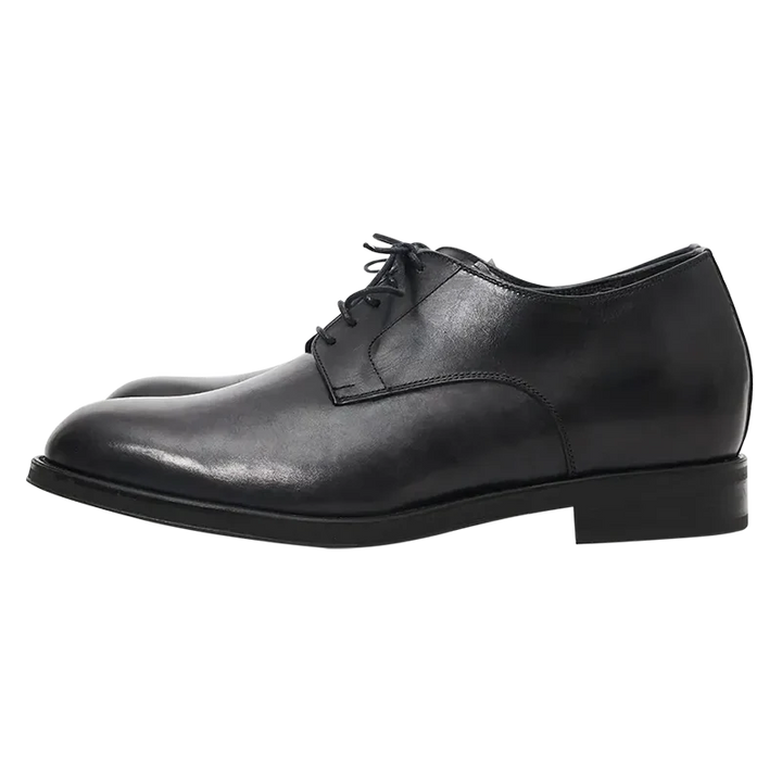 Calzature uomo nere formali rialzate, con design raffinato e soletta interna per un aumento altezza di 7cm.