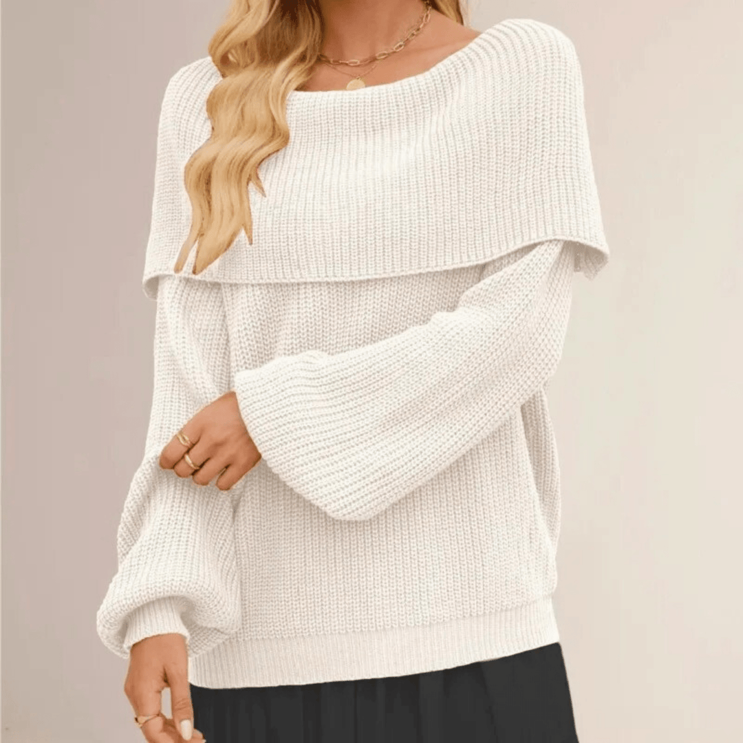 Morbido maglione donna con scollo a barca e spalle scoperte, ideale per moda autunnale e vestiti chic.