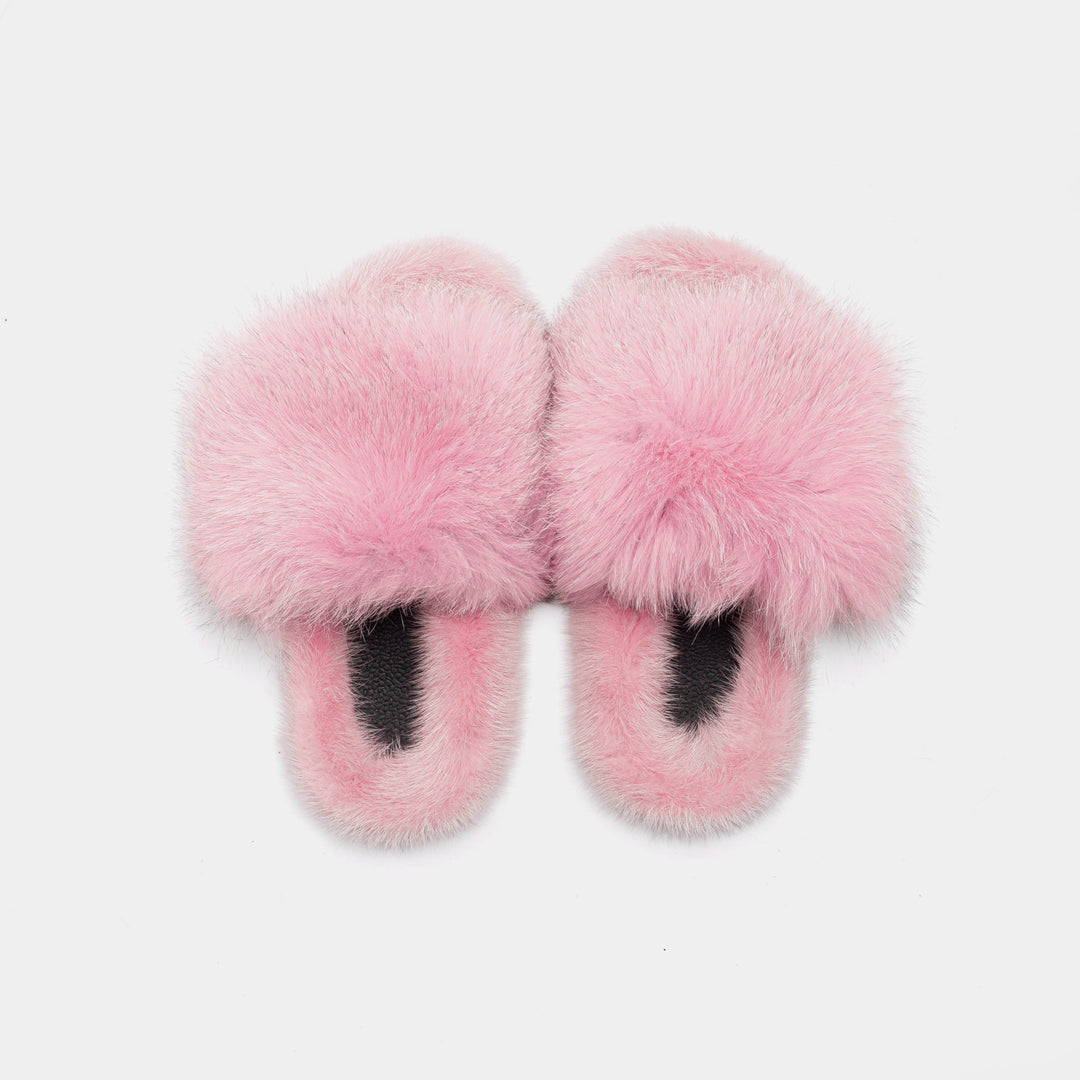 Morbide pantofole donna rosa in pelliccia di volpe e visone, un tocco di eleganza e comfort per la casa.