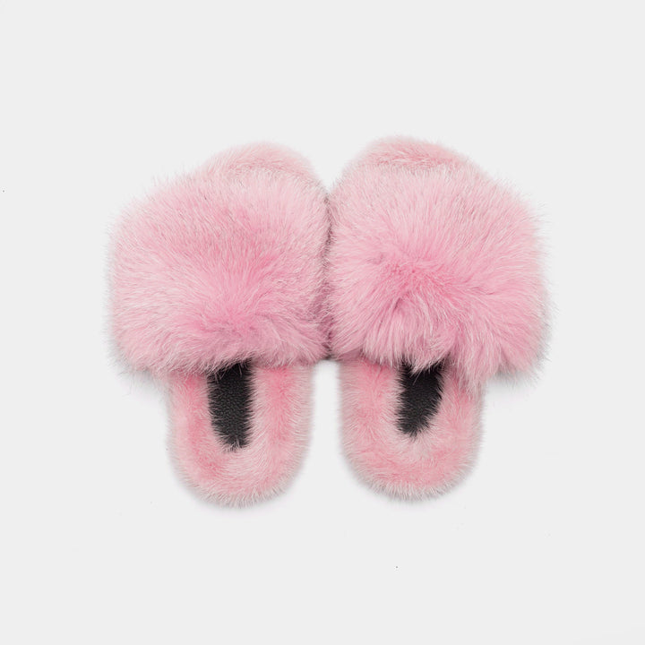 Morbide pantofole donna rosa in pelliccia di volpe e visone, un tocco di eleganza e comfort per la casa.
