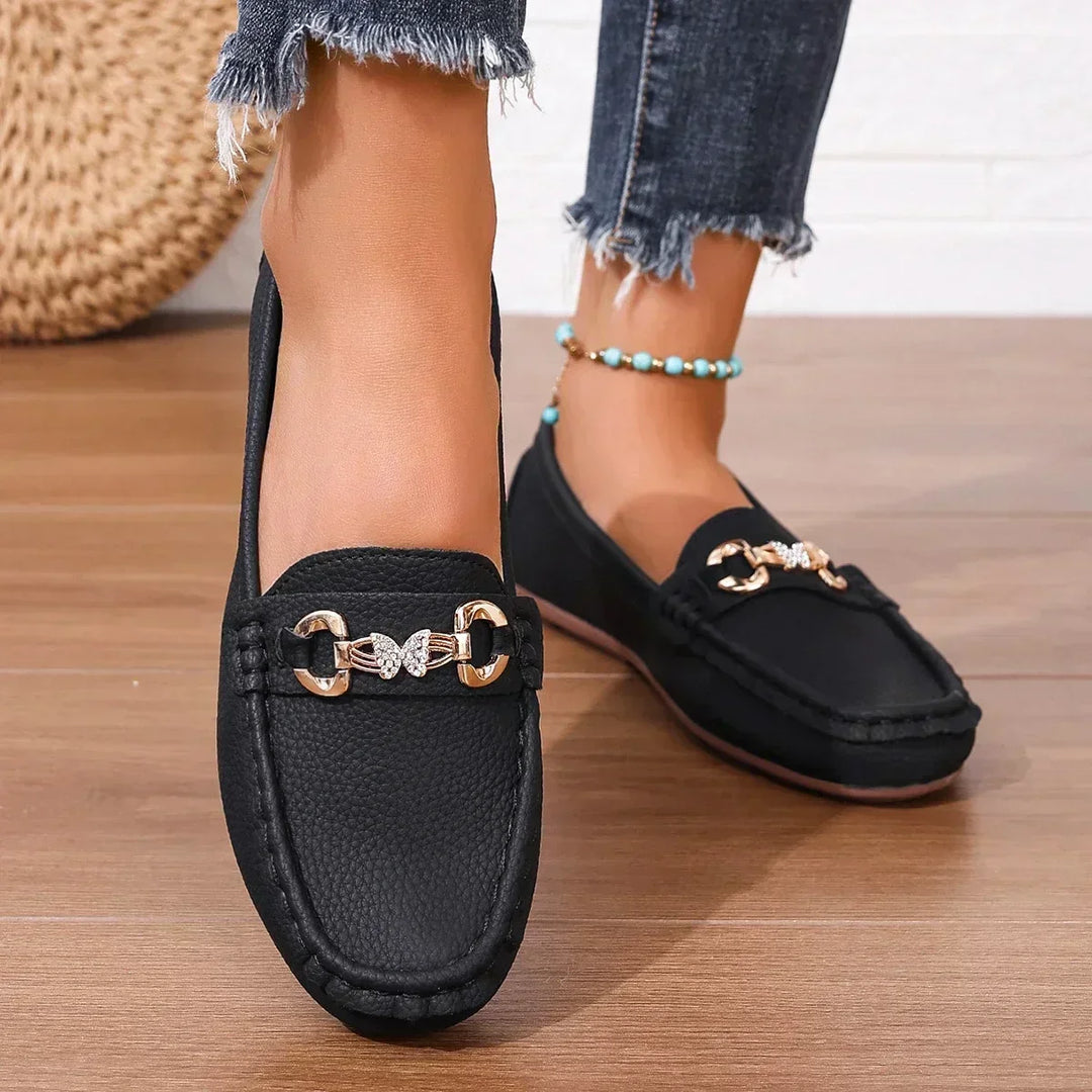 Mocassini donna casual estivi con dettaglio farfalla, perfetti per l'uso quotidiano.