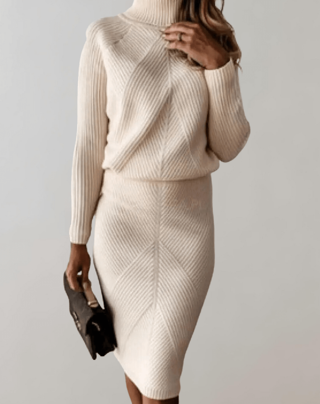 Set due pezzi donna: maglia a coste e gonna aderente. Comfort ed eleganza casual.