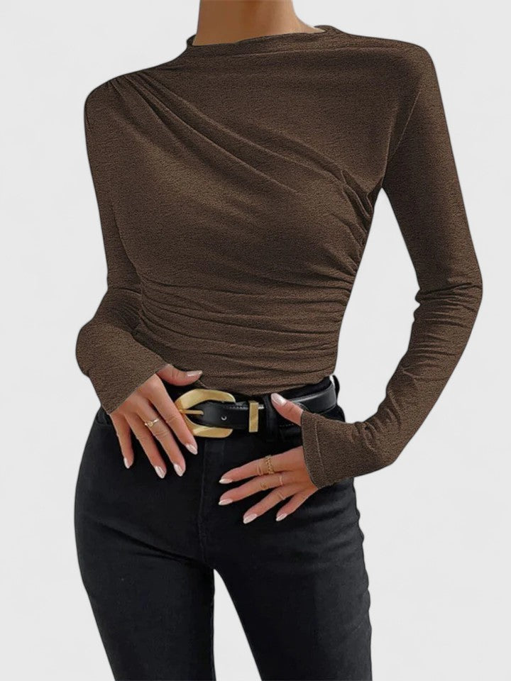 Blouse donna a maniche lunghe, versatile e confortevole, perfetta per completare outfit eleganti o casual. [[lstfy-media:10]]