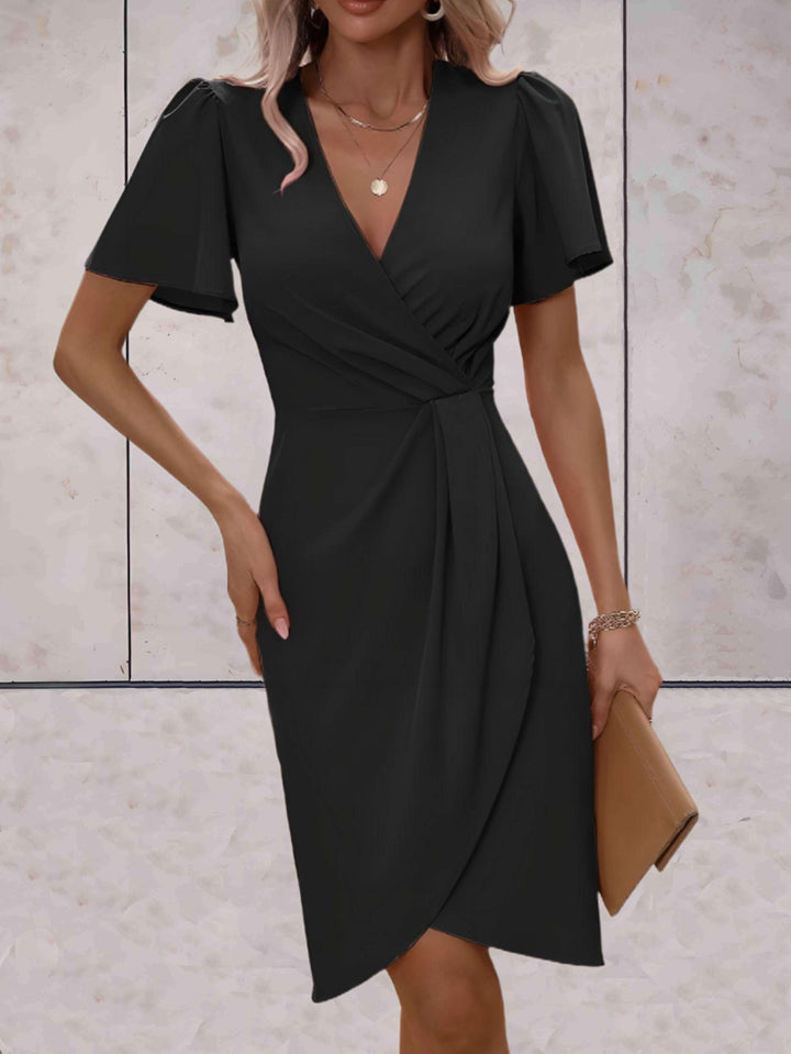 Abito da donna slim fit elegante, avvolgente con maniche fluide, un must-have per la moda primavera autunno.