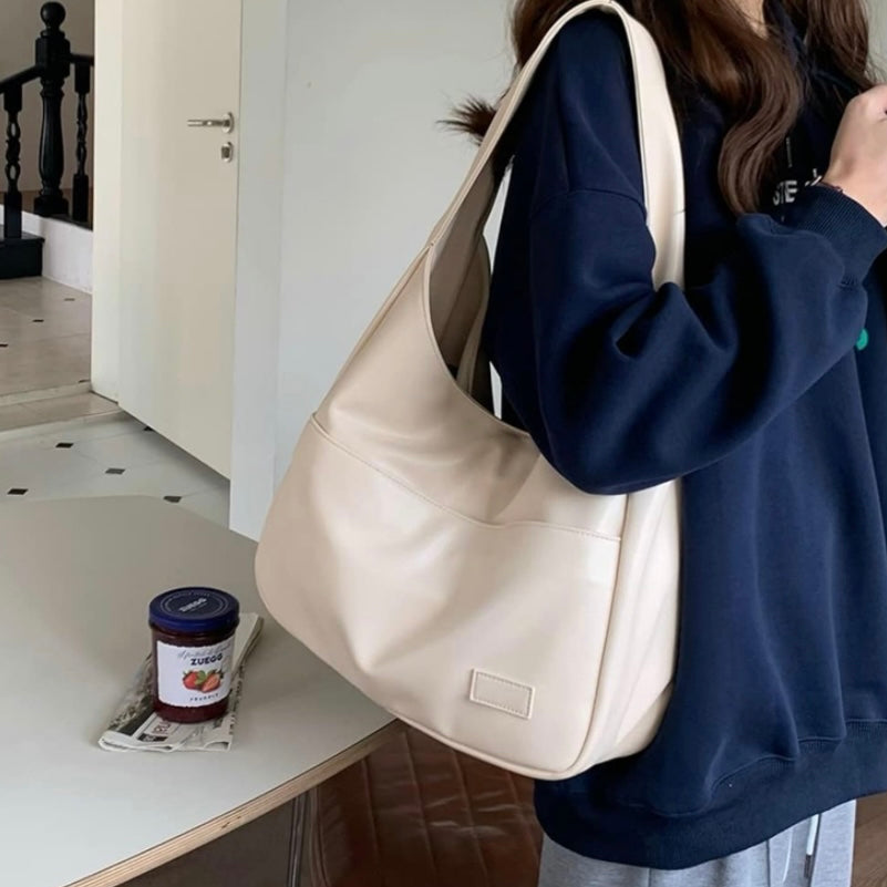 Borsa premium da donna in pelle, tracolla regolabile, perfetta per viaggio e lavoro.