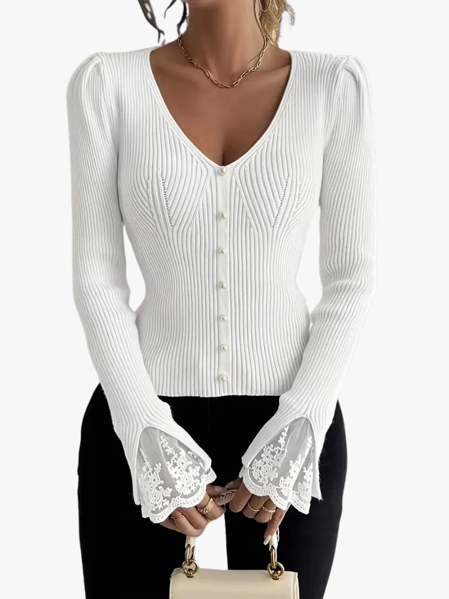 Maglione donna beige a coste con scollo a V, stile casual elegante. Perfetto per comfort quotidiano e moda autunnale.
