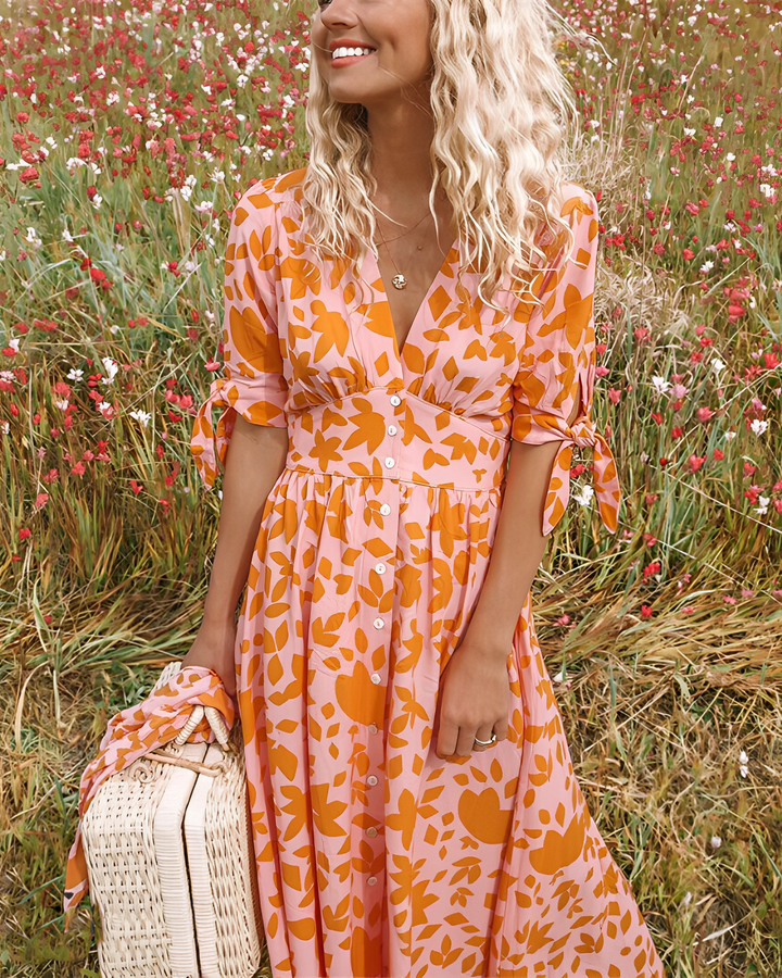 Abito midi floreale da donna con scollo a V, colorato, perfetto per l'estate e outfit da giorno. Moda estiva vivace.
