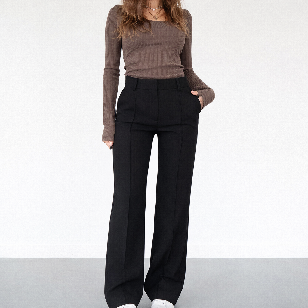Pantaloni donna vita alta, taglio dritto elegante, perfetti per look casual chic o ufficio.