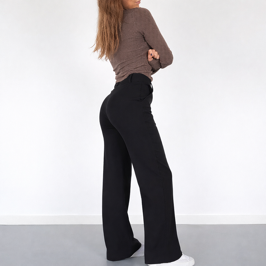 Pantaloni donna a vita alta, taglio dritto, un classico versatile per abbigliamento ufficio o tempo libero.