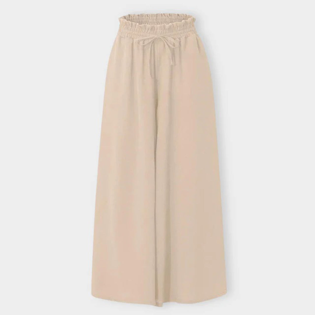Pantaloni palazzo donna taglie forti, a vita alta e gamba larga con coulisse, per comfort e stile.