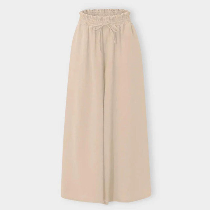 Pantaloni palazzo donna taglie forti, a vita alta e gamba larga con coulisse, per comfort e stile.