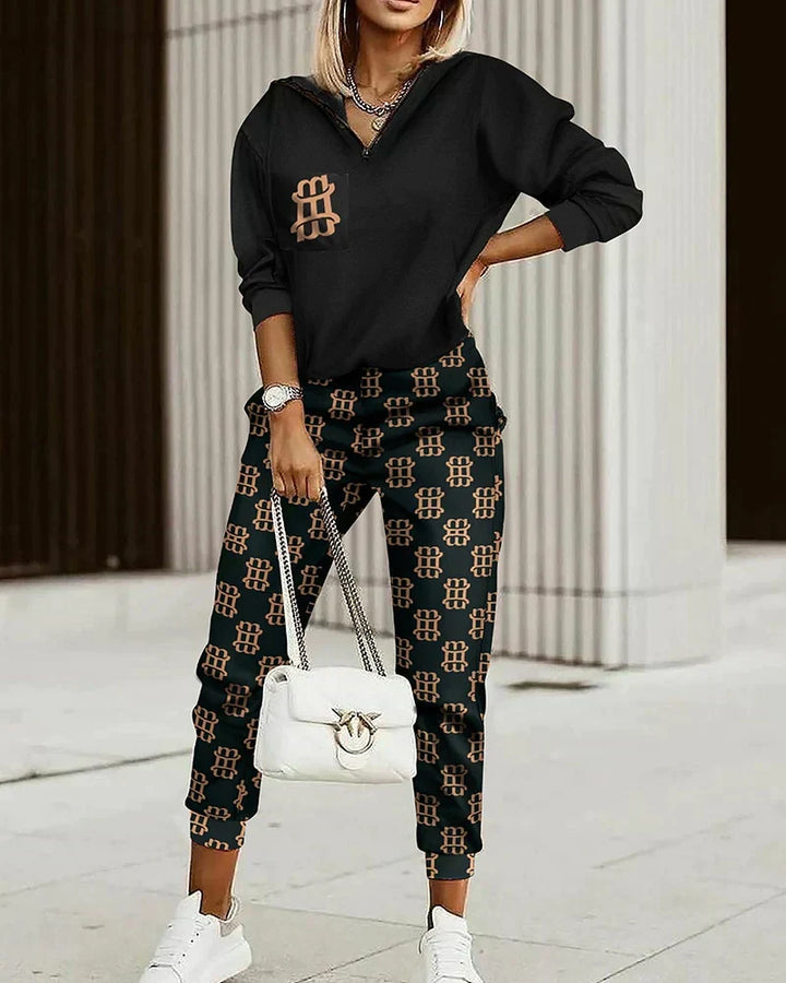 Tuta donna casual-chic, set due pezzi per stile quotidiano. Perfetta per il relax e attività leggere.