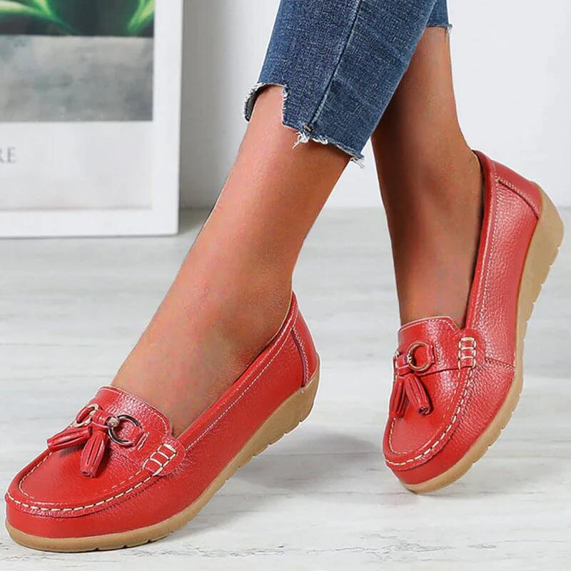 Scarpe donna con fiocco e frange, mocassini piatti in pelle, comodi per il lavoro o il tempo libero.
