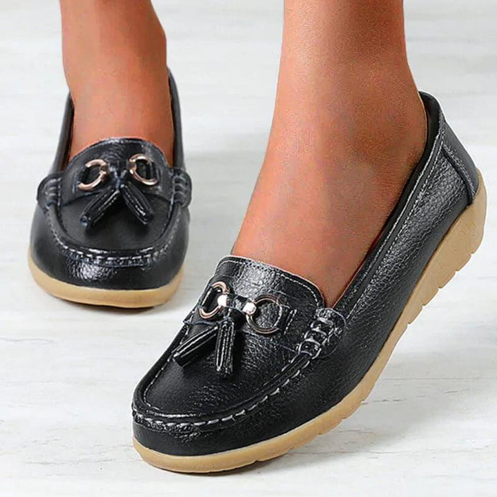 Mocassini comodi da donna, scarpe piatte in pelle con fiocco e frange, calzature versatili.