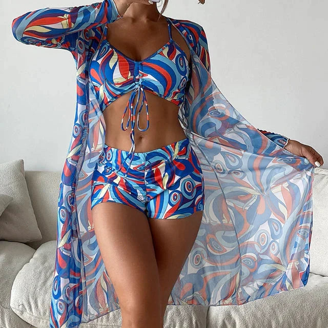 Moda mare: Bikini donna tre pezzi versatile con copricostume. Stile estivo elegante per spiaggia o relax in piscina.