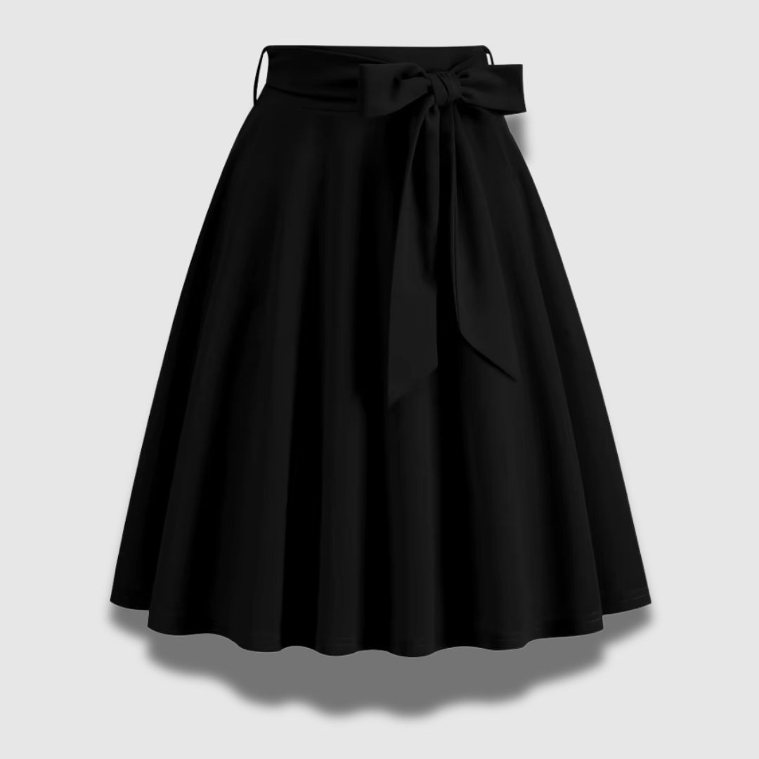 Gonna donna stile vintage, svasata a vita alta con cintura. Eleganza senza tempo, per un look raffinato e di tendenza.