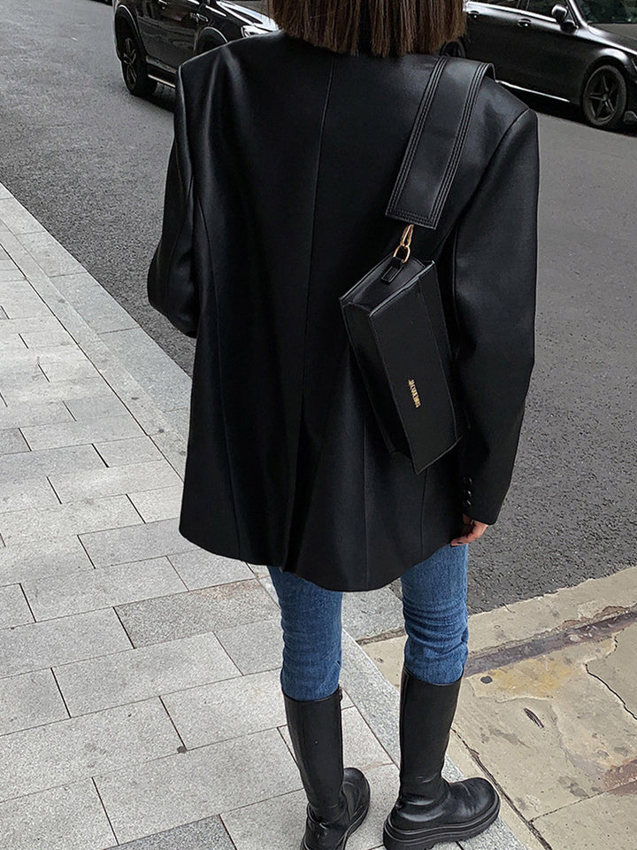 Giacca blazer oversize donna, stile urbano trendy con revers a scatto, ideale per streetwear.