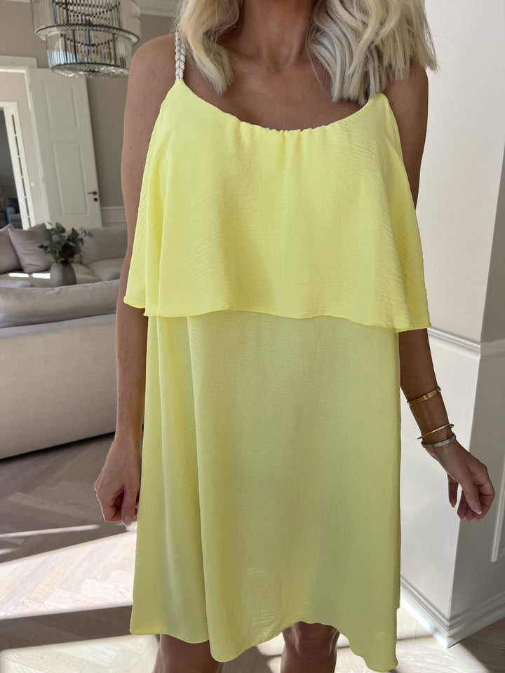Vestito elegante midi per donna, perfetto per cerimonie o appuntamenti.