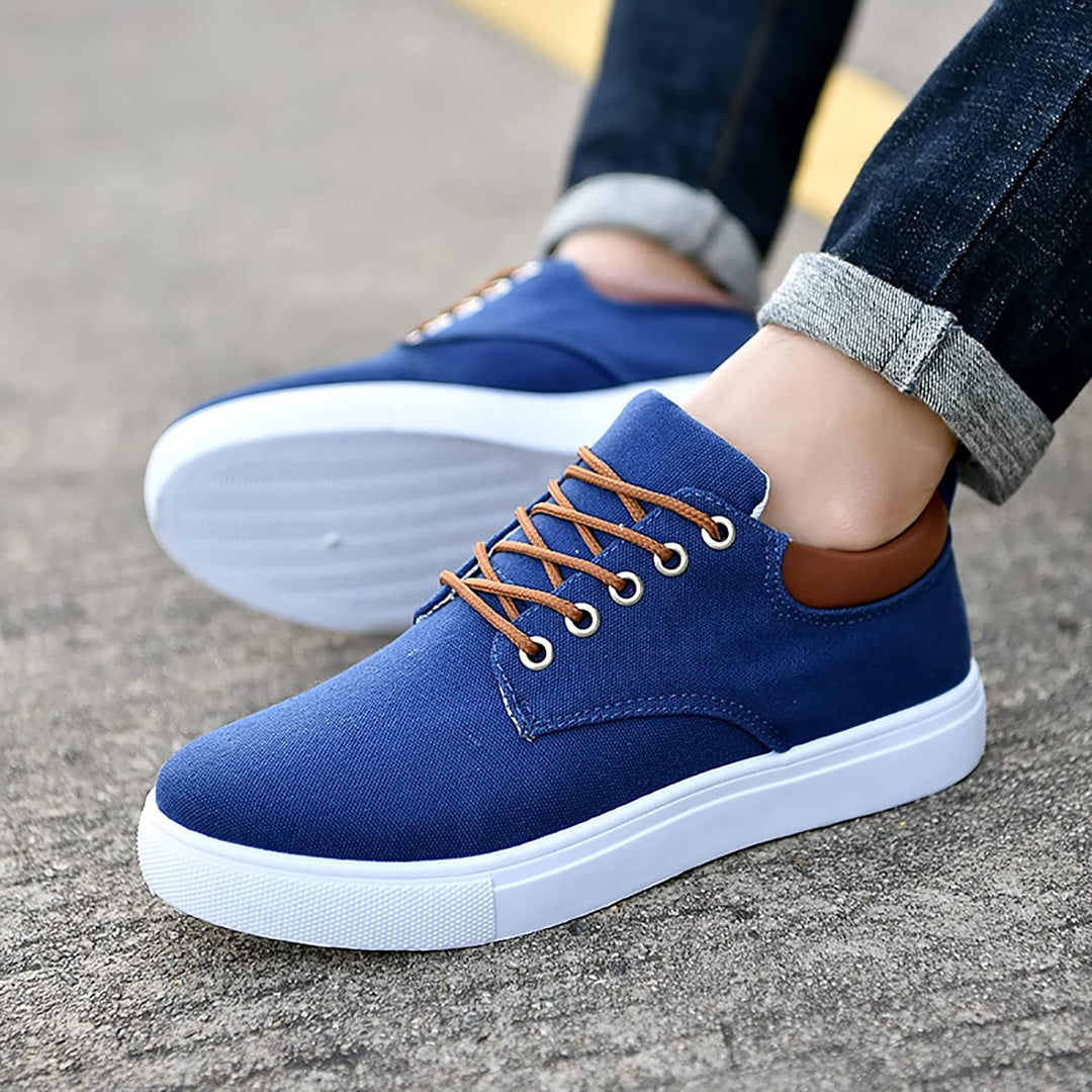 Calzature uomo: sneakers sportive con suola bianca, ideali per uno stile casual e rilassato.