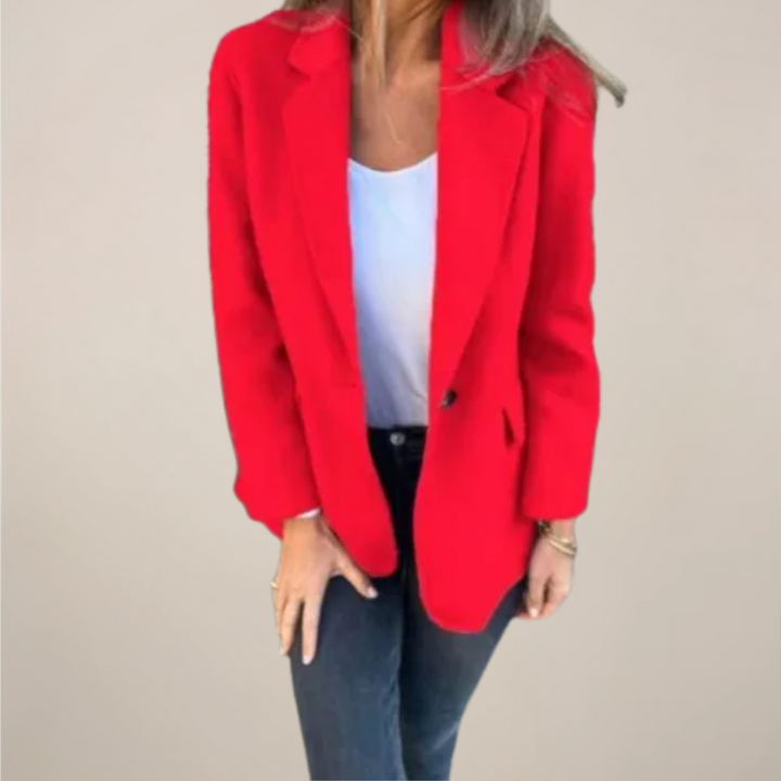 Giacca blazer donna in tessuto pregiato, monopetto con colletto a revers, simbolo di eleganza e moda femminile.