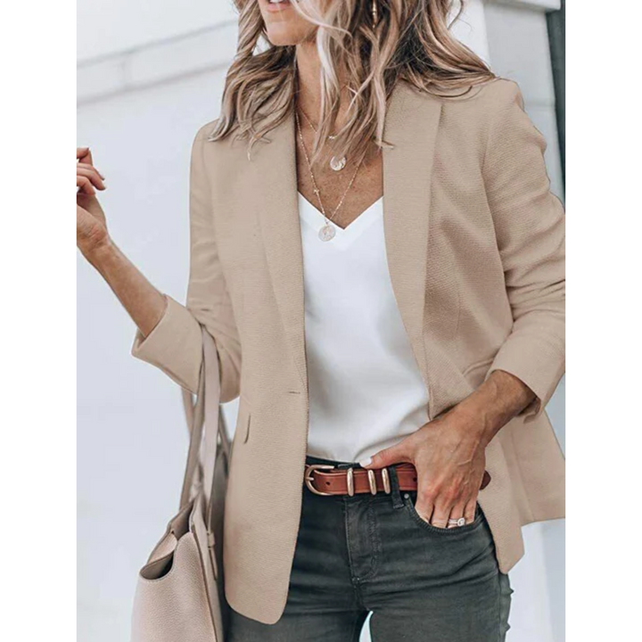 Elegante blazer da ufficio donna, design aperto con revers, versatile per un look chic da giorno o sera.