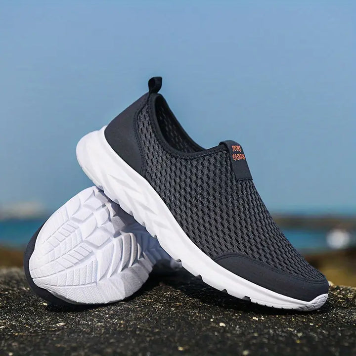 Scarpe da uomo blu senza lacci, sneakers ortopediche leggere e traspiranti per un benessere ottimale del piede.