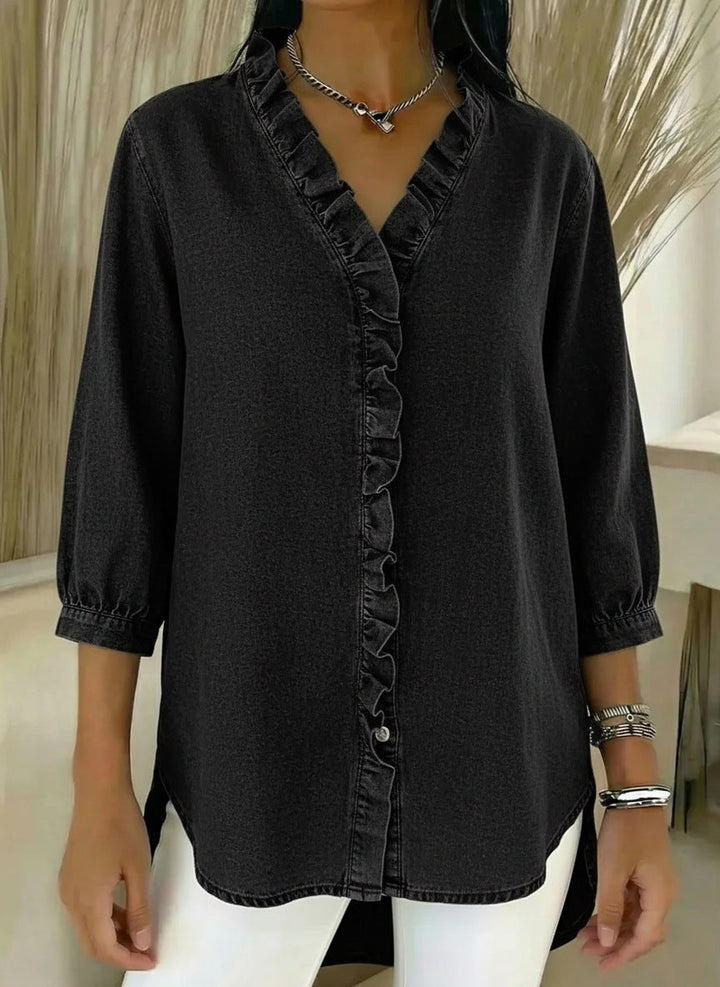 Abbigliamento femminile: blusa con volant e scollo a V, maniche 3/4, un top versatile per ogni guardaroba.