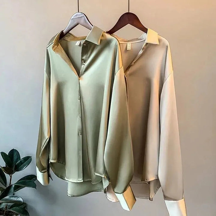 Camicia donna satinata versatile, ideale per moda casual chic o outfit eleganti da ufficio.