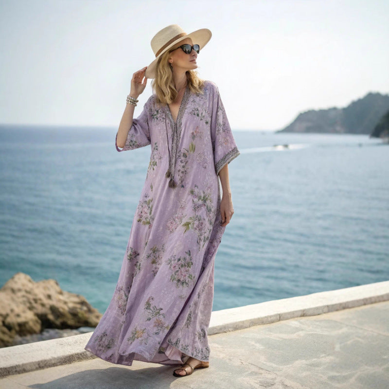 Vestito maxi boho chic da donna, ideale per l'estate, con stampe etniche colorate.