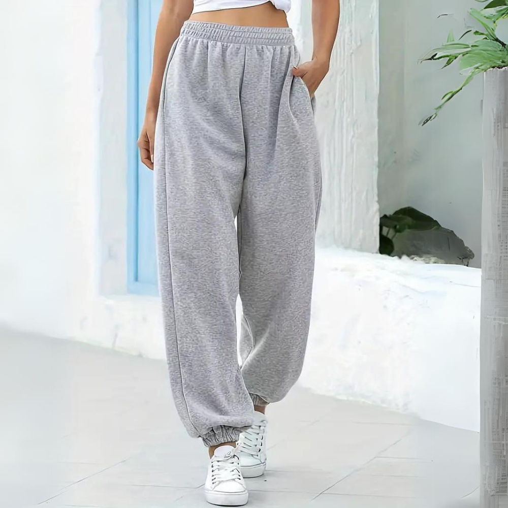 Pantaloni tuta donna larghi a vita alta, joggers casual per massimo comfort e relax.
