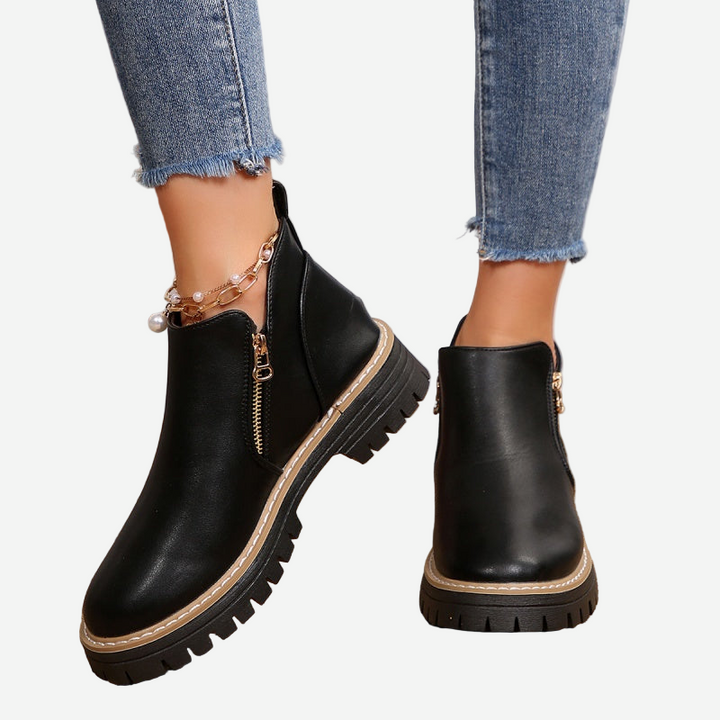 Stivaletti donna neri casual-eleganti, con platform e zip, calzature comode per autunno/inverno.