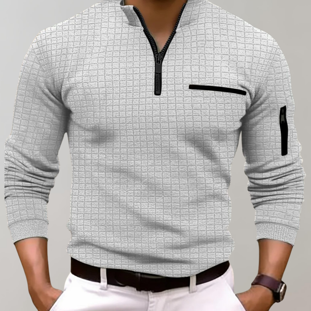 Polo uomo elegante e versatile a manica corta, con design a coste aerodinamiche. Perfetta per ogni occasione.