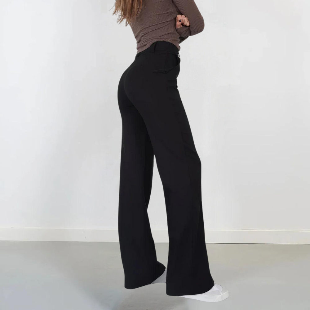 Abbigliamento femminile: pantaloni a gamba larga e vita alta per un look versatile, moderno ed elegante.
