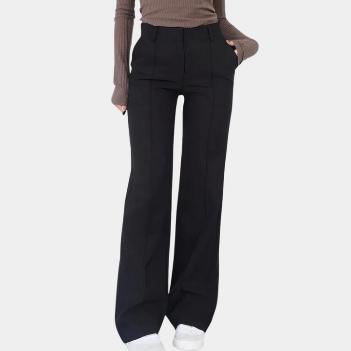 Pantaloni donna ampi a vita alta, stile casual-elegante. Perfetti per comfort quotidiano, moda versatile.