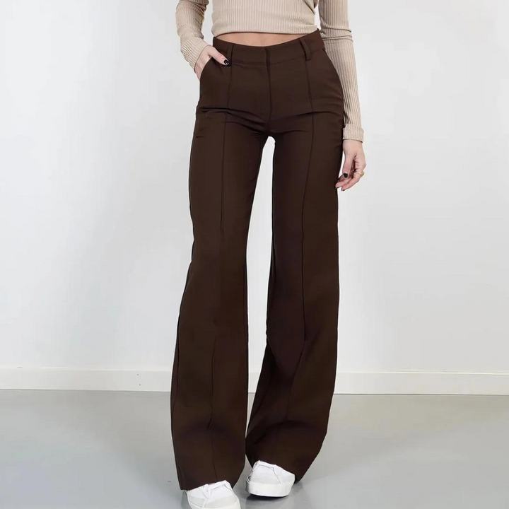 Pantaloni eleganti da donna a vita alta, gamba larga. Un capo versatile per comfort quotidiano e moda.