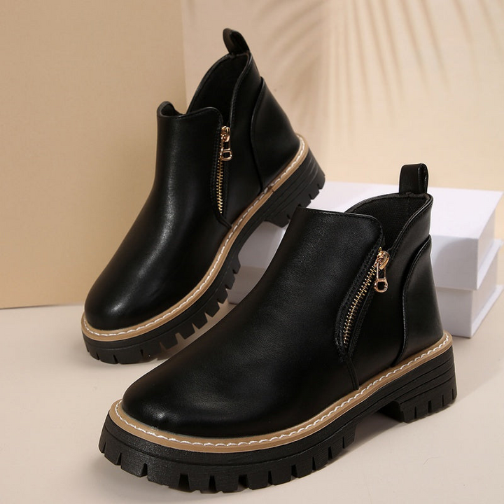 Stivali donna neri, stivaletti platform con zip laterale, ideali per la moda inverno e autunno.