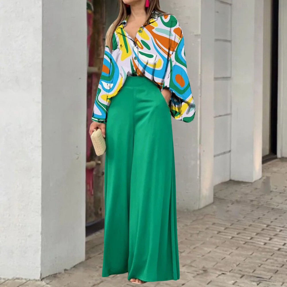 Completo donna 2 pezzi: camicia stampata e pantaloni larghi. Ideale per un look elegante ma casual e versatile.