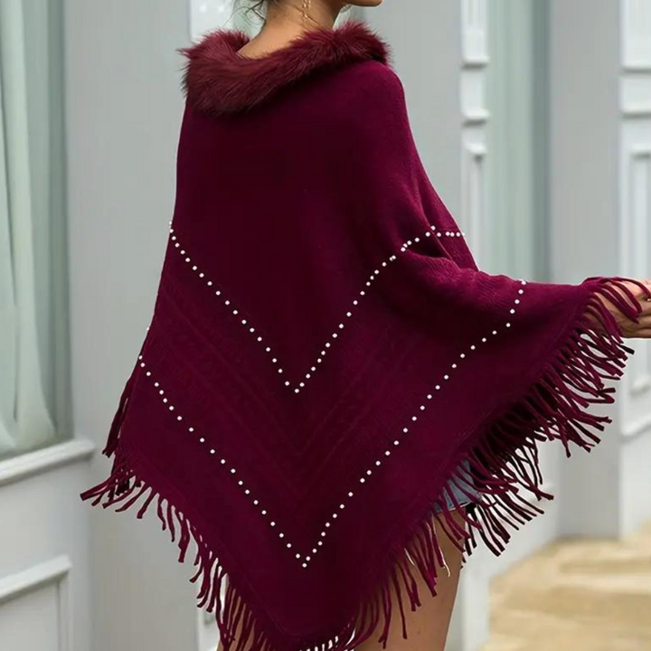 Poncho maglia donna rosso, un capo versatile ed elegante per il tuo abbigliamento. Moda e comfort.
