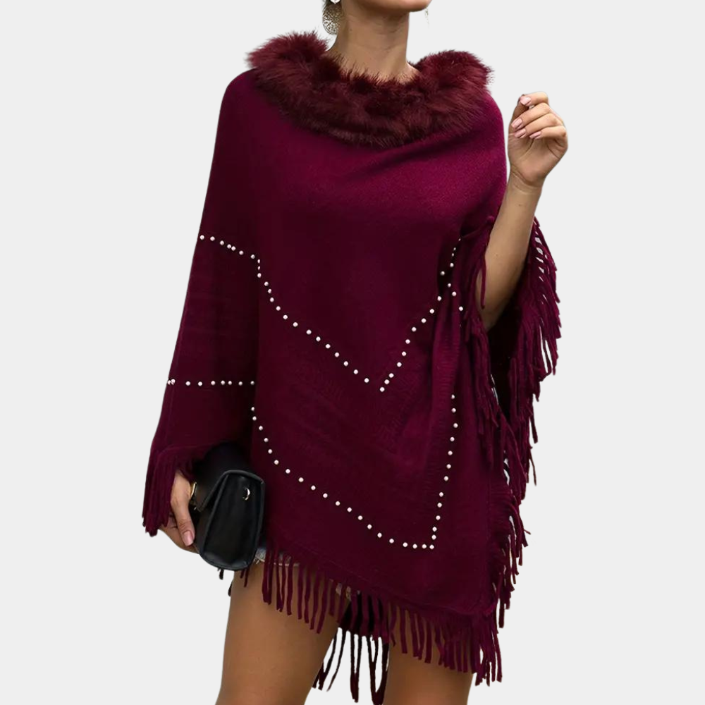Poncho donna rosso raffinato, morbido e versatile. Perfetto per un look casual o per serate eleganti.