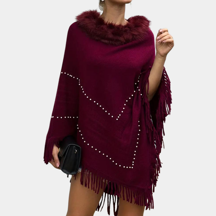Poncho donna rosso raffinato, morbido e versatile. Perfetto per un look casual o per serate eleganti.