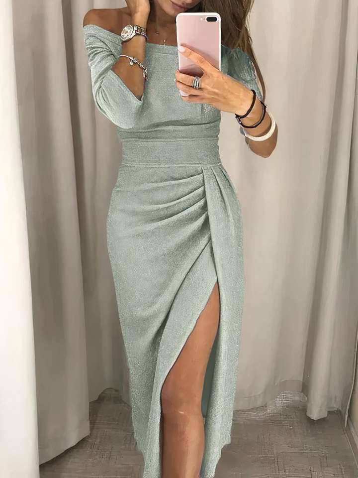 Abito midi donna versatile, elegante, con scollo a V e spacco. Ideale per un outfit casual-chic o da ufficio.